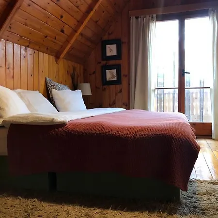 Wooden House In The Nature